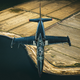 Image for article titled This Photographer Used Real Jets To Recreate The Famous Top Gun Inverted Photo